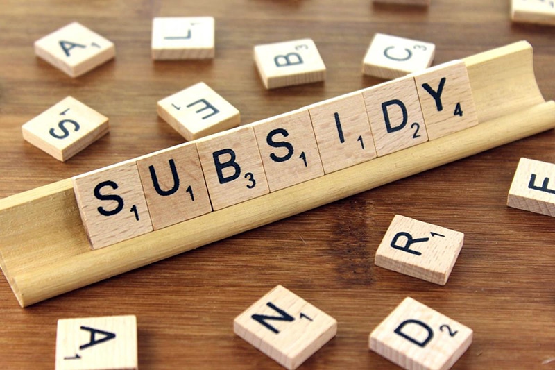 Operating subsidies for affordable housing developments (scrabble tiles spelling "subsidy")