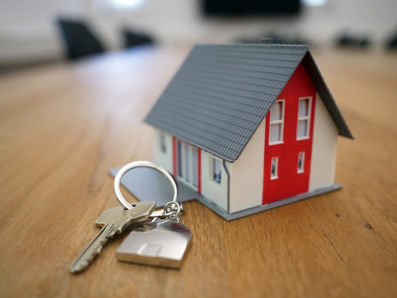 Setting income eligibility levels for local housing programs (house keychain)