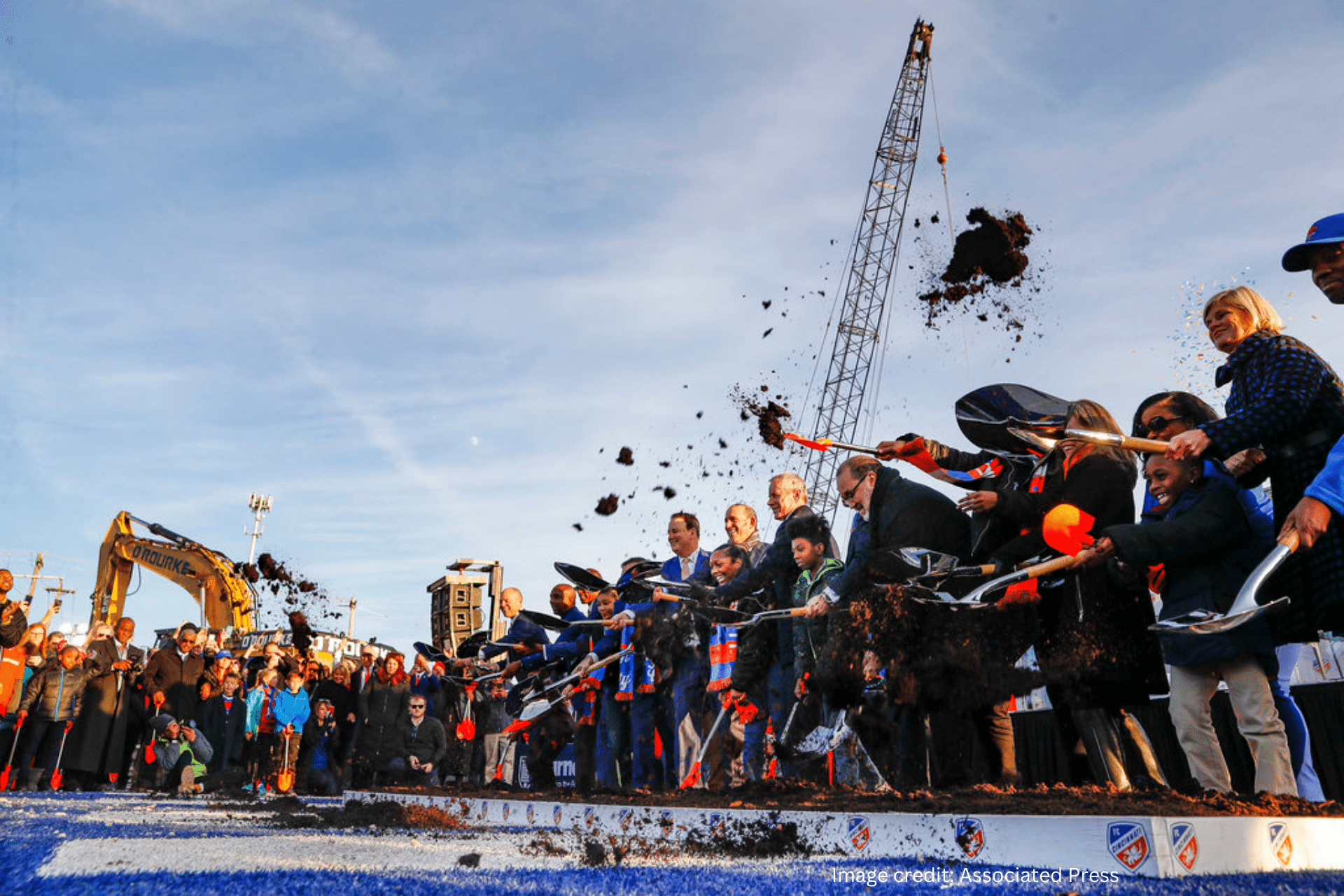 Project leaders, local politicians, and members of the West End Community participate in a formal groundbreaking ceremony on a new stadium for the new Major League Soccer expansion team FC Cincinnati, Tuesday, Dec. 18, 2018, in the West End neighborhood of Cincinnati.